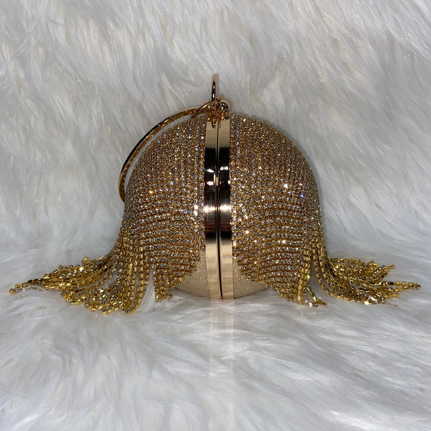 Cartera Redonda Dorada